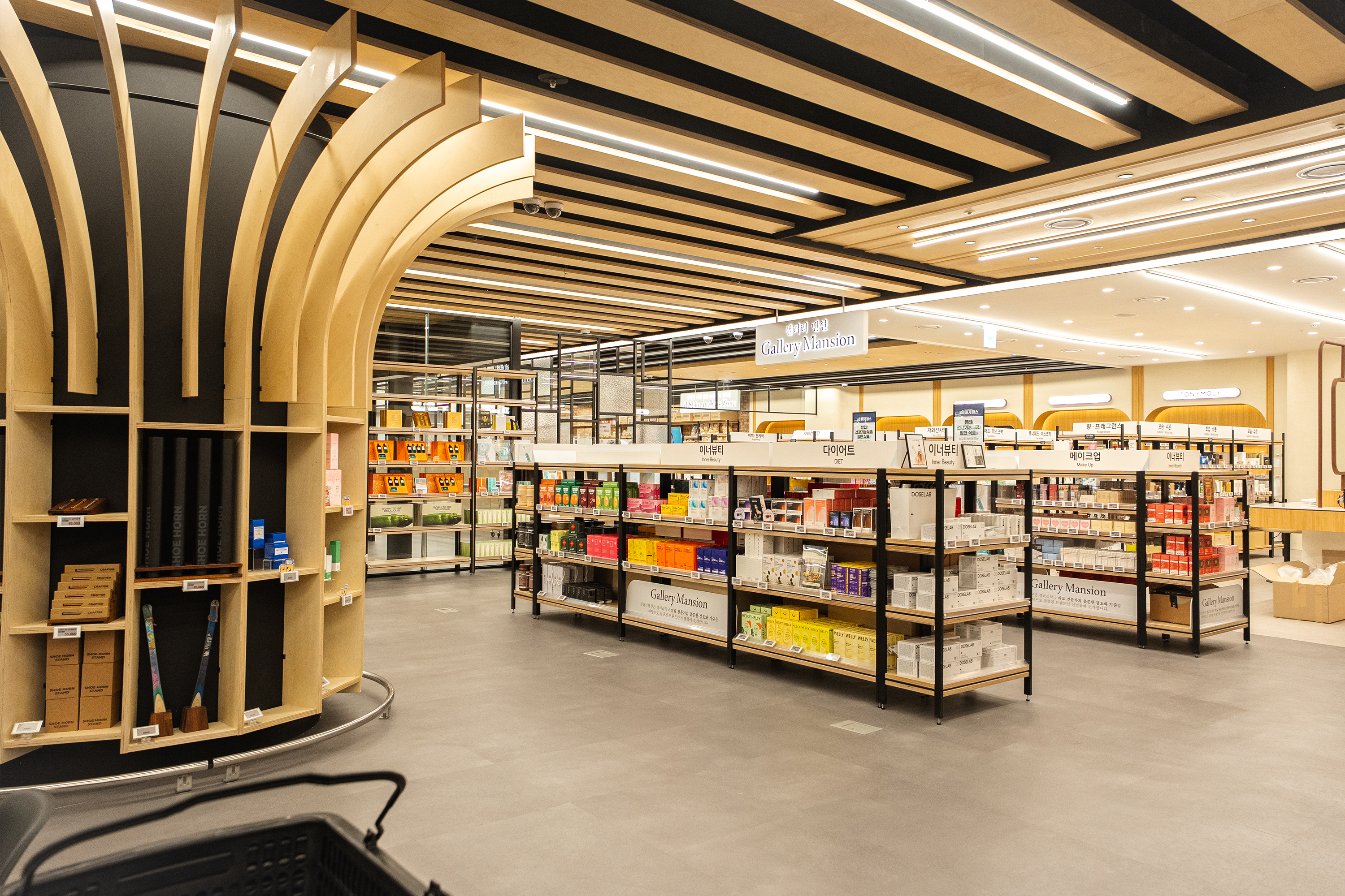 Inside a Korean pharmacy with shelves of products